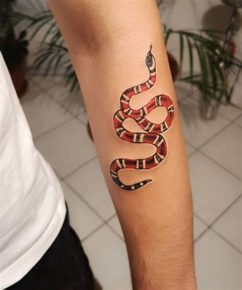 gucci snake tattoo|snake wrap around arm tattoo.